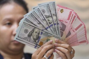Rupiah Tembus Rp17.700, Mirae Proyeksikan BI Rate Tetap 4,75%