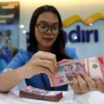 Suku Bunga The Fed Tekan Rupiah, Simak Proyeksi Kurs Jumat Ini